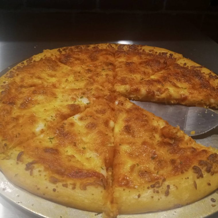 A golden cheese pizza