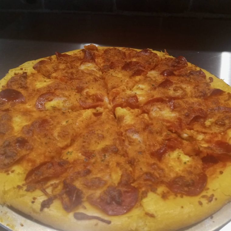 A fresh pepperoni pizza